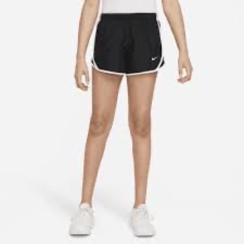 - I’m selling girls large Nike black and white shorts